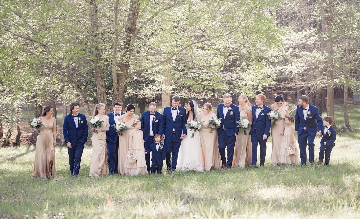 Wedding party enjoying the grounds at Rock Bottom Pond